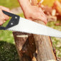 Close-up of hand saw with hardened steel blades.